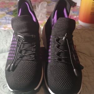 Black Sneakers with Purple Accents